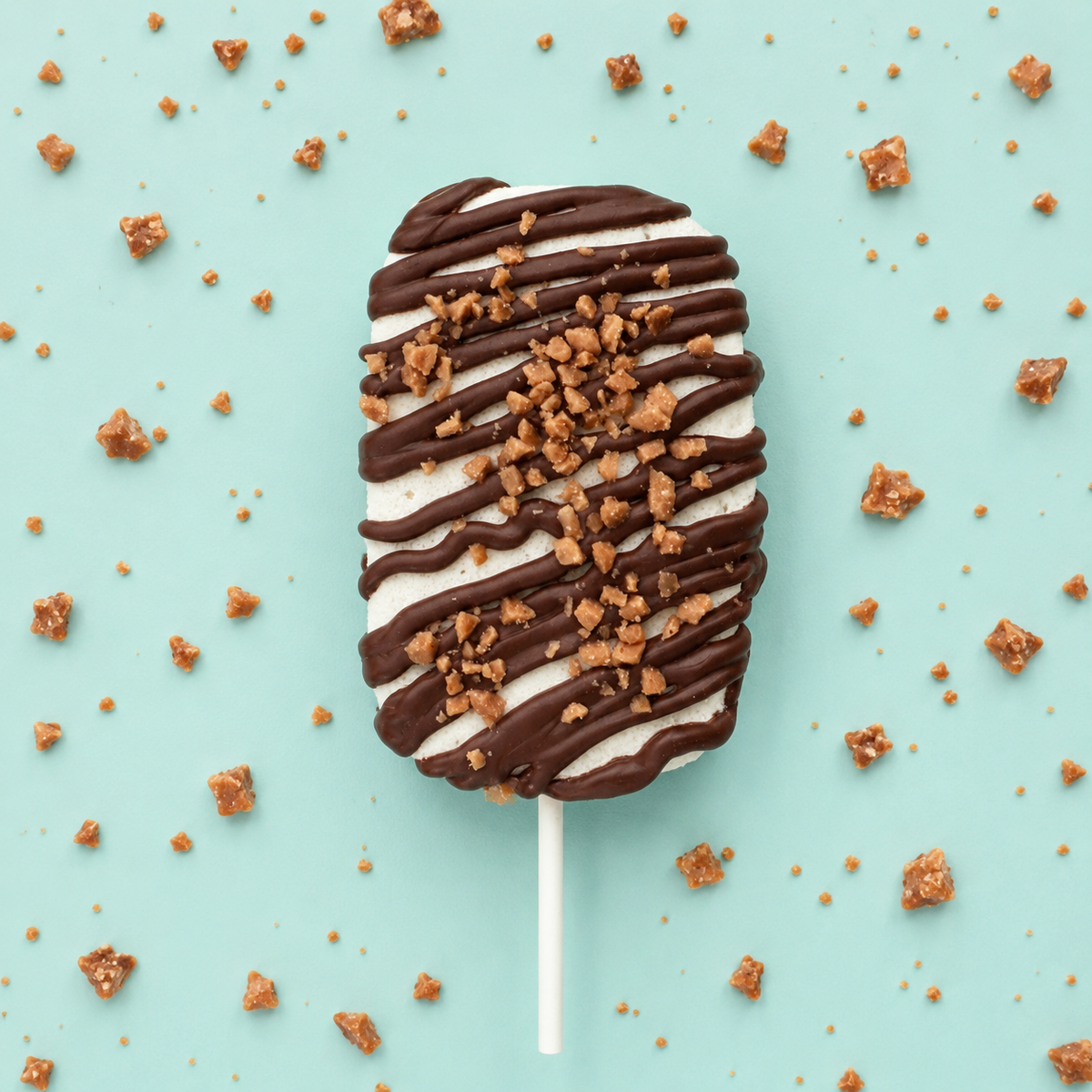 Toffee Temptation gourmet marshmallow pop with milk chocolate drizzle and crunchy toffee pieces